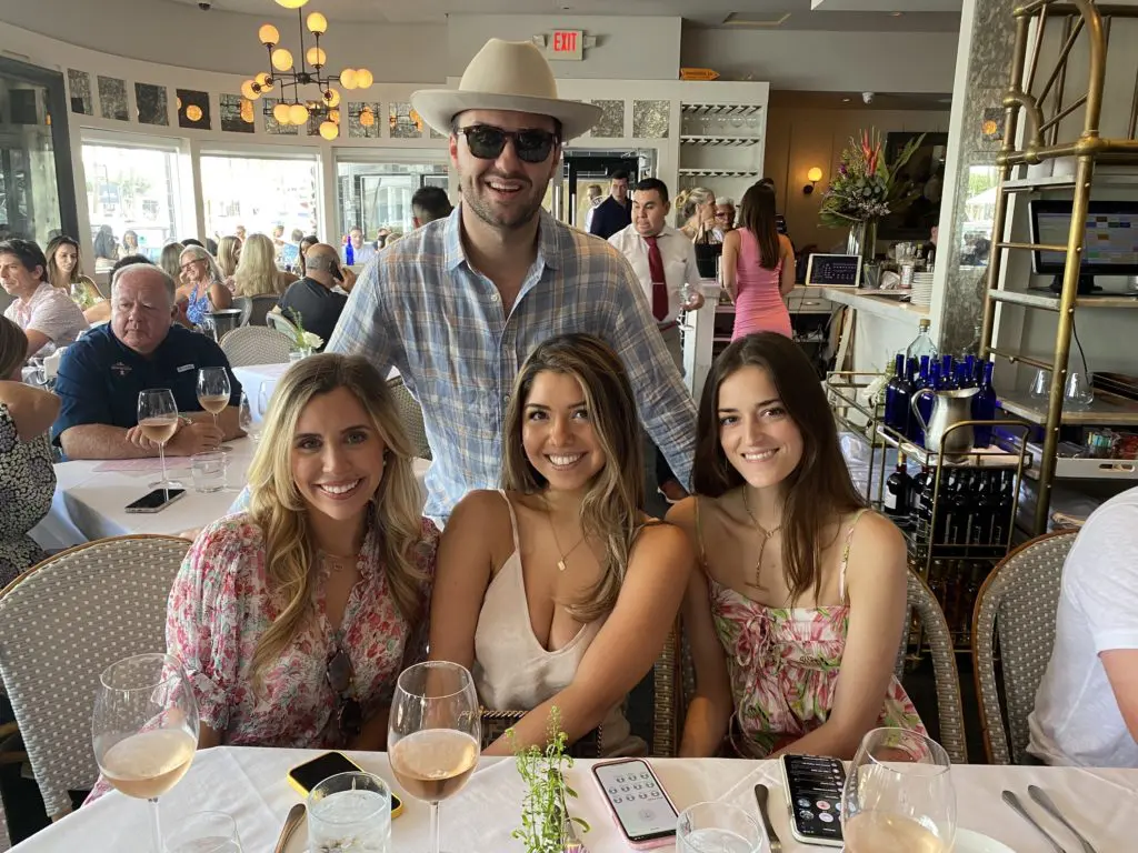 Troup Rolland, standing, Madison Marchbanks, Megan Rodriguez, Kirby Wheat at the Brasserie 19 Rosé All Day bash. (Photo by Shelby Hodge)