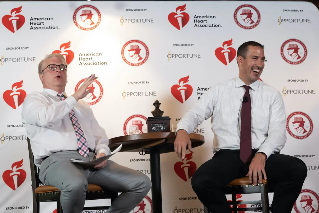 Houston Texans team analyst John Harris conducts a Q&A with 2021 Paul 'Bear' Bryant Award winner Luke Fickell, head football coach at the University of Cincinnati. (Photo by Daniel Ortiz)