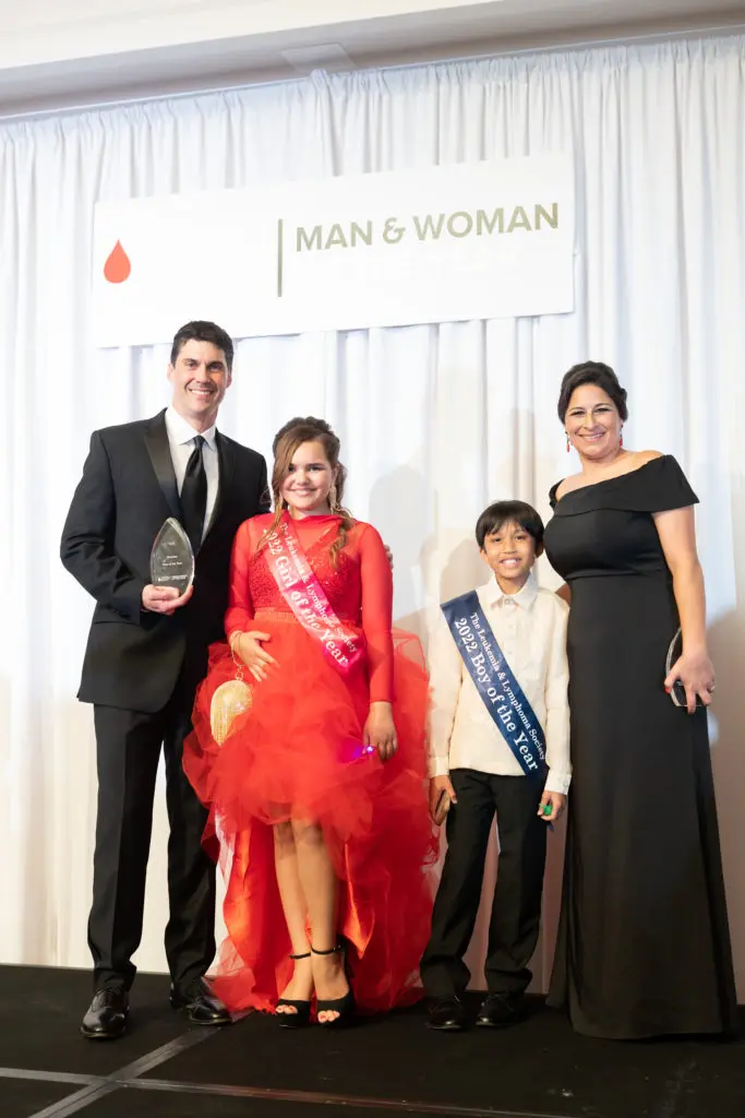  Leukemia & Lymphoma Society Man of the Year Chris Bolio and Woman of the Year Meredith Jamail Rice with the boy and girl of the year who inspired the record fundraising. (Photo by Daniel Ortiz)