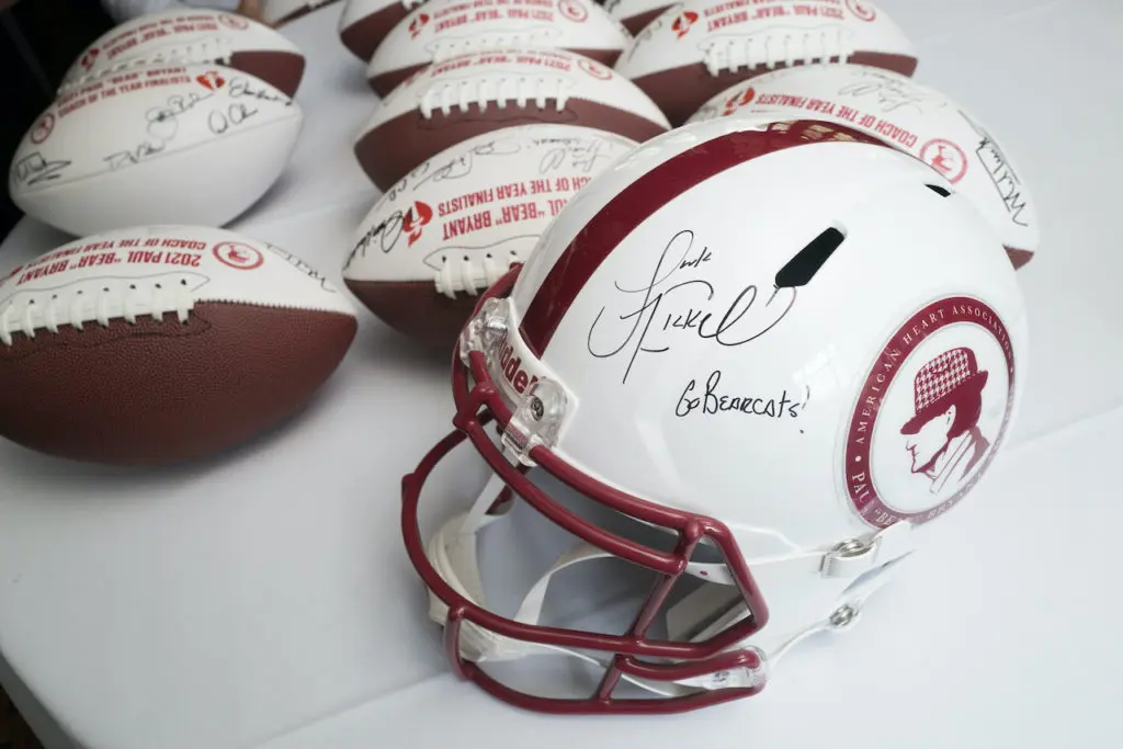 Luke Fickell's autographed 'Bear' Bryant helmet  presented at the Coach of the Year luncheon, sponsored by the American Heart Association  (Photo by Daniel Ortiz)