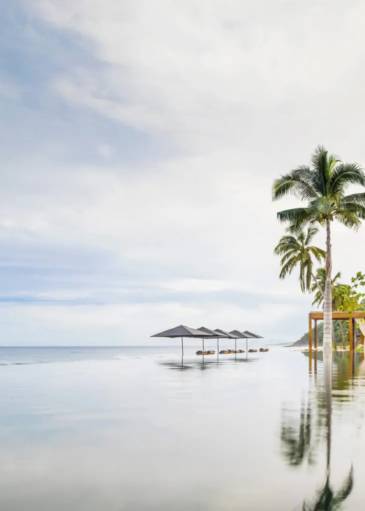 Aside from the impressive wellness programming at One&Only Mandarina, soaking up the sun at their white sand beach is a transformative experience on its own.