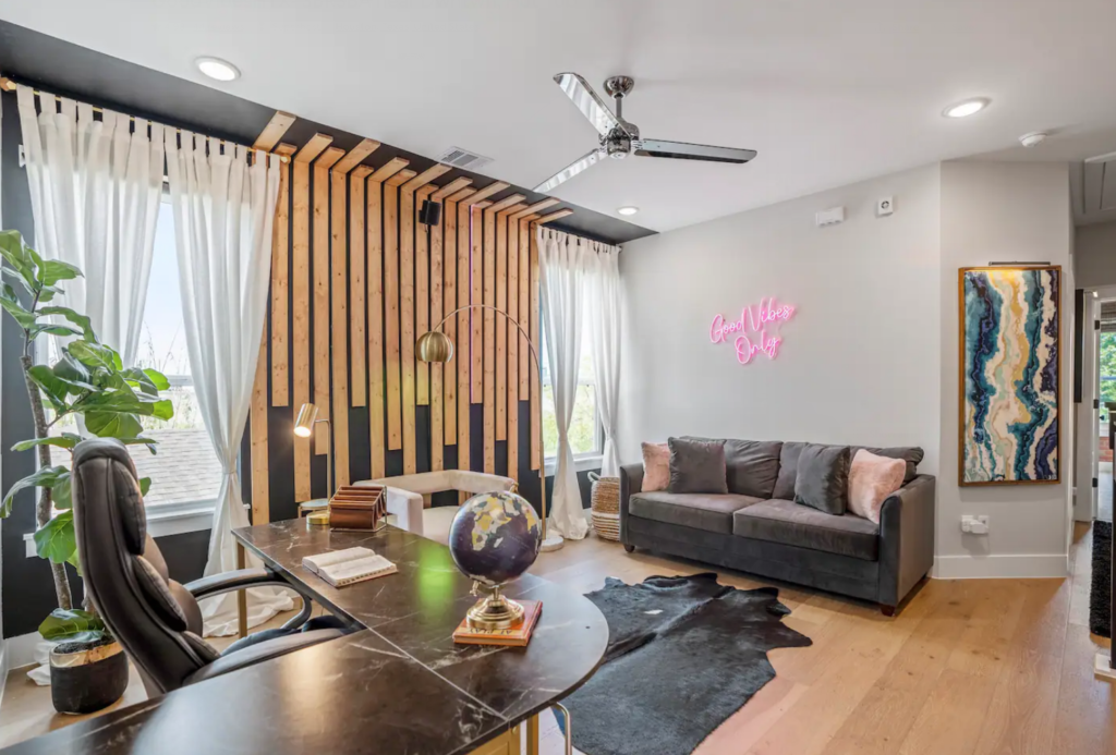 The Good Vibes HTX Airbnb features speedy wifi at 320 Mbps, plus a dedicated workspace in a common area.
