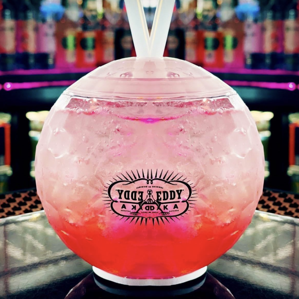 Share a huge Deep Eddy's drink and sing kareoke with a friend at modern gay bar, Buddy's. (Photo by: Buddy's)