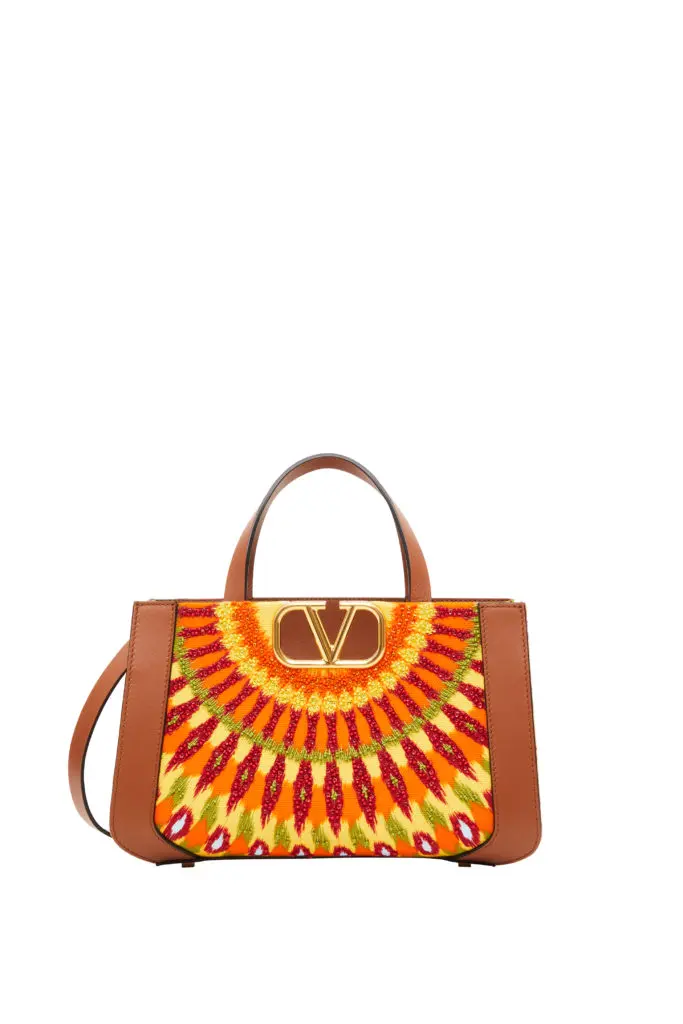 Valentino V Logo Small Canvas Tote, $2,190, Available at Neiman Marcus NorthPark (Courtesy of Valentino)