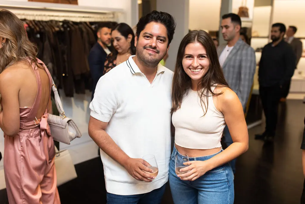 Vlad Garza, Mikaela Wall at Cocktails for a Cause at Michael Kors in The Galleria (Photo by Leah Wilson Photography)