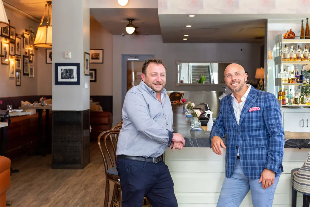 Benjamin Berg and Valerio Lombardozzi, the general manager of La Table. The restaurant is closing Friday and will be reimagined entirely and reopened in 2023. (Photo by Jenn Duncan)