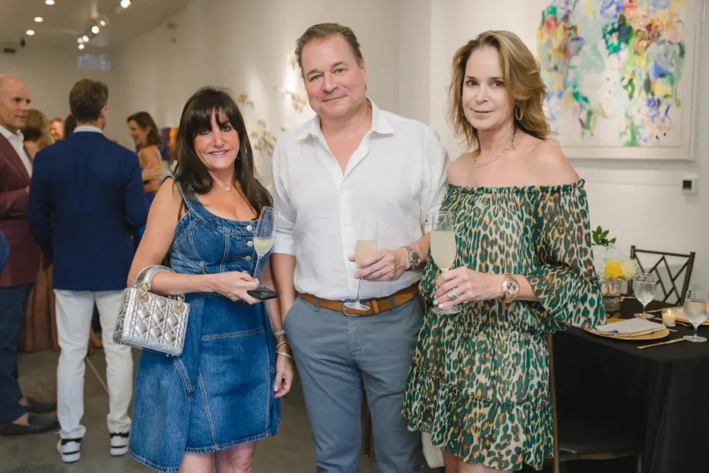 Karen Selzer, Edward & Kendall Ondarza at "Wanderlust" opening at Laura Rathe Fine Art  (Photo by Johnny Than)