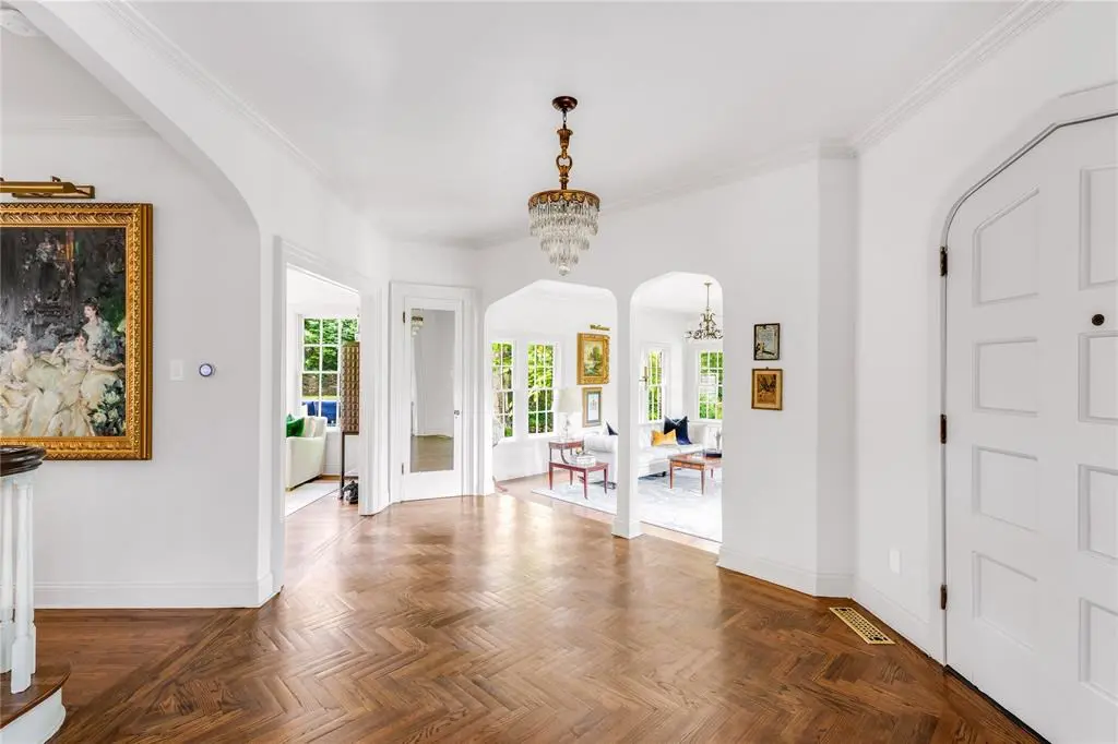 Arched doorways and crown moldings guide you throughout the home’s 3,000 square feet.