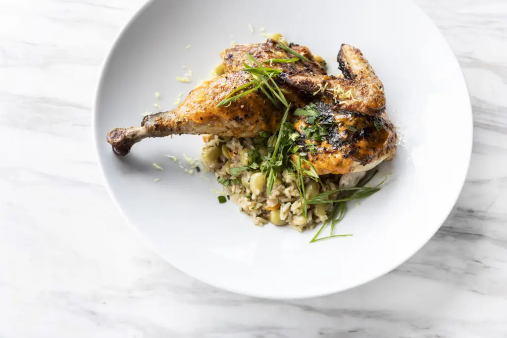 If you want other options besides beef, there's Fried Holmes Chicken on the menu served with dirty rice. Photo by Julie Soefer.