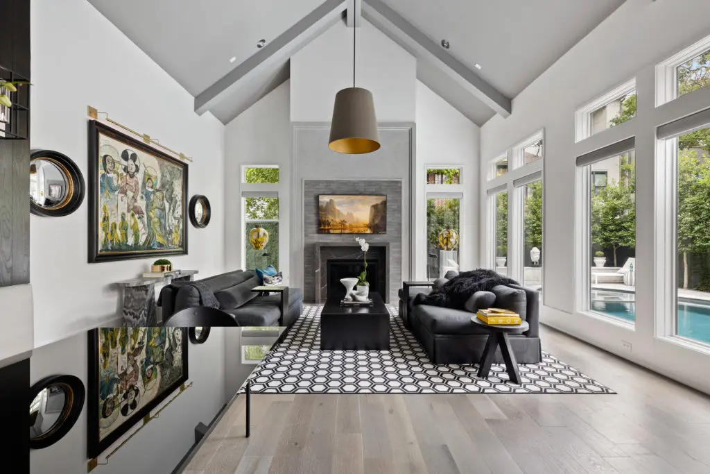 The open living plan at 2028 Park Street features soaring, beamed ceilings. (Photo by Josh Gremillion)