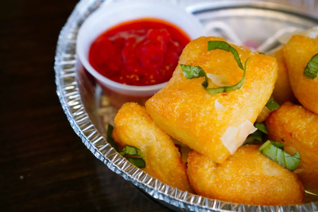 Betelgeuse Betelgeuse's Space Balls are puffy pizza dough balls with a side of marinara sauce and roasted garlic butter.  (Photo by Courtesy of Betelgeuse Betelgeuse )