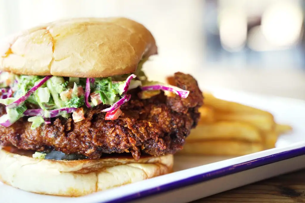 Sandwiches like this mighty fried chicken one will be available at the new Fins and Feathers. (Photo by Lindsey Cooper)