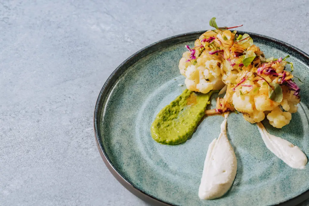 Toro Toro does Latin lite, like this grilled cauliflower.