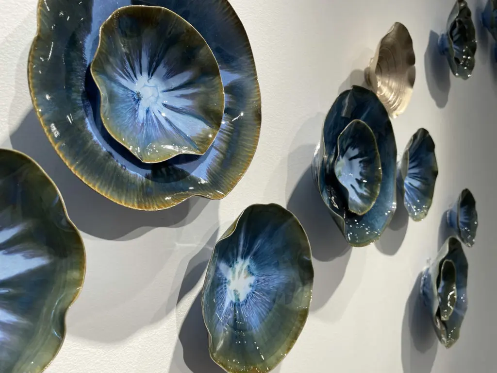 Lucrecia Waggoner's glazed porcelain vessels at "Wanderlust" opening at Laura Rathe Fine Art (Photo by Johnny Than)