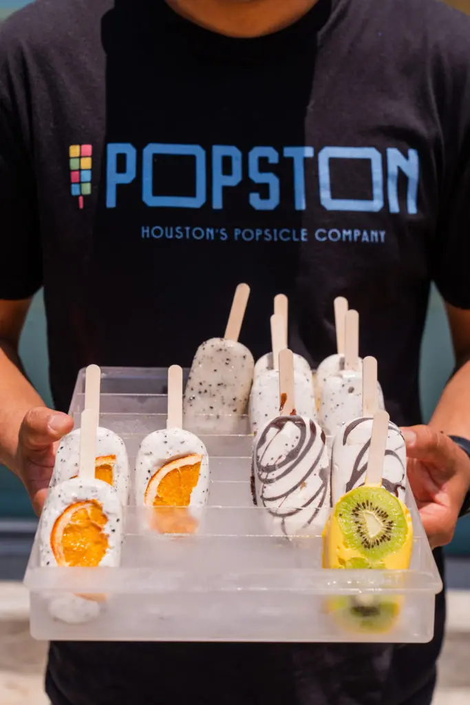 Creator Jonathan Delgado whips up creamy gelato-style popsicles at his new East End shop, Popston. (Photo by Michael Anthony)