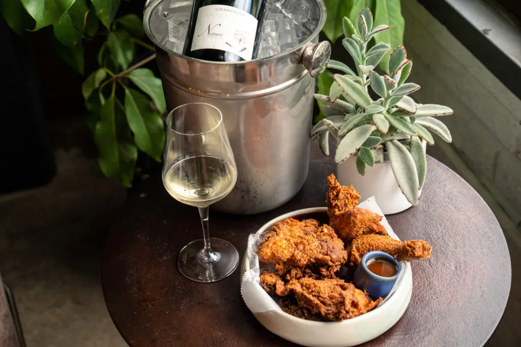 Wednesday night, it's the Birds and Bubbles special, where diners can indulge in half-a-fried chicken with biscuits and champagne.  (Photo by Michael Anthony)
