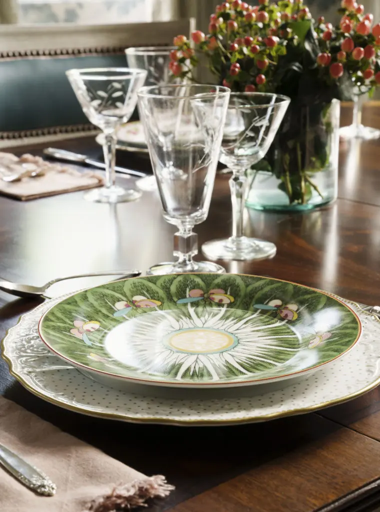 Vintage china from the homeowner's  grandmother is set on the  dining room table. (Photo by Jack Thompson)