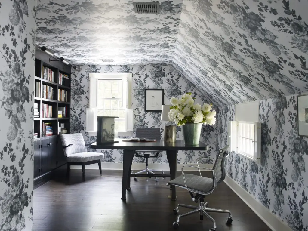 Sills chose an English floral paper for the upstairs study of this 18th-century New England home, which is set on 50 acres of picturesque apple orchards. (Photo by William Waldron)