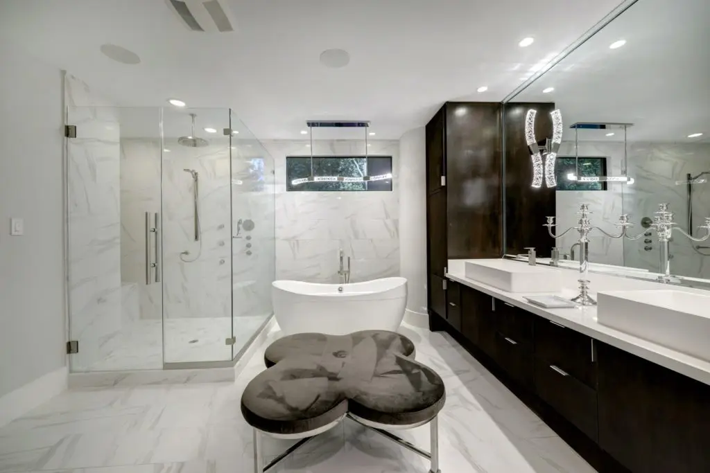 One of two primary baths in the home at 11686 Arrowwood Circle in Piney Point Village.  (Photo by TK Images for Martha Turner Sotheby’s International Realty  )