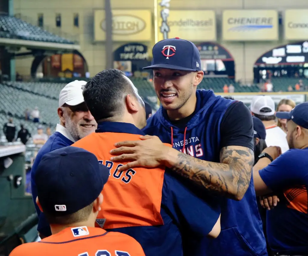 Carlos Correa had plenty of people to hug in his return to Minute Maid Park. (Photo by F. Carter Smith)