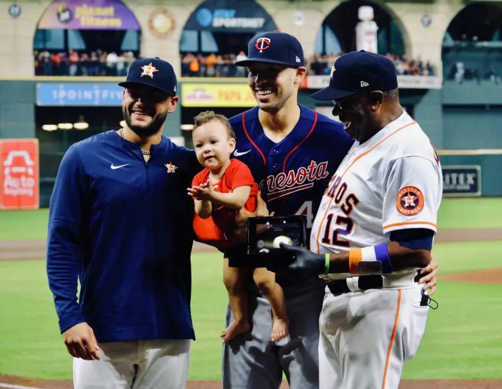Lance McCullers Jr., little Kylo Correa, Carlos Correa and Dusty Baker created quite a ring scene. (Photo by F. Carter Smith)