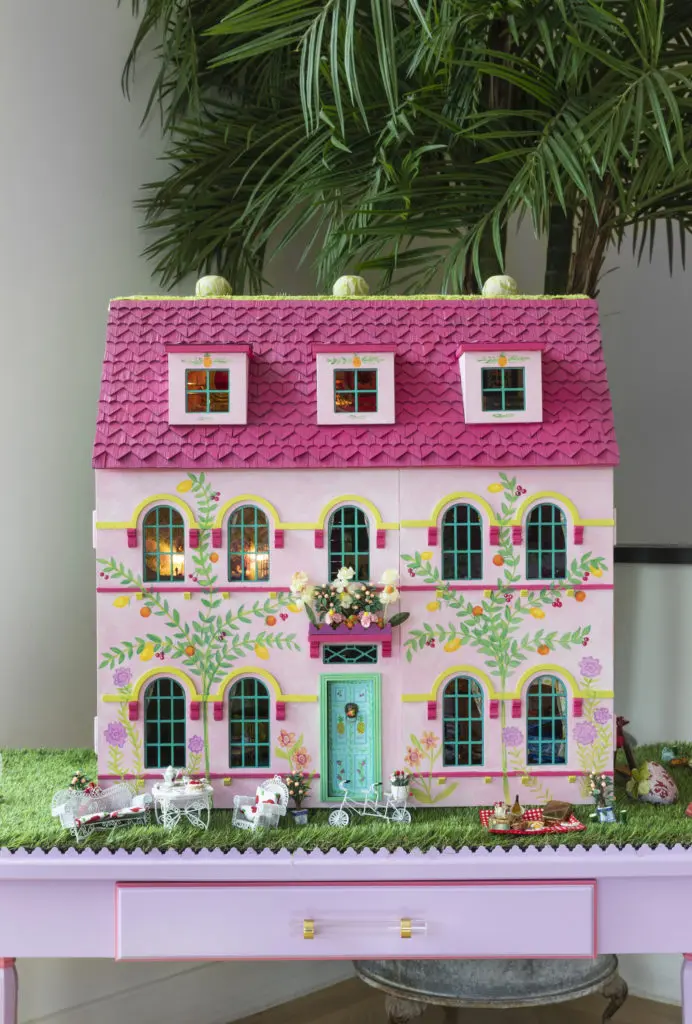 The traditional dollhouse is one of three designs by Newbury Architecture, constructed by Stetzer Builders, for A Shelter for Cancer Families' gala auction. (Photo by Claudia Casbarian for Julie Soefer)