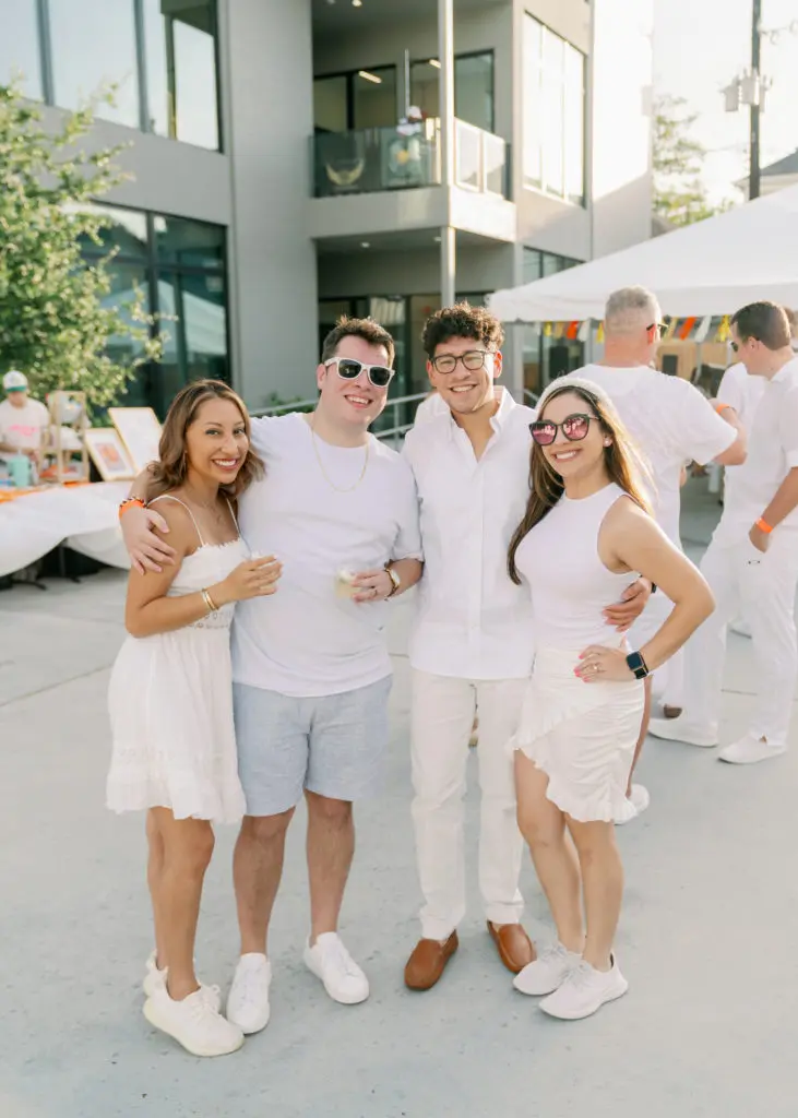 Betty & David Enriquez, Jarrell Gomez, Michelle Arreguin at Nan & Company Properties' party during White Linen Night in The Heights. (Photo by Nan Studios)