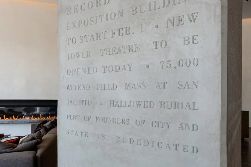 A column of old Houston Chronicle headlines brings a distinctive touch to The Brava lobby.