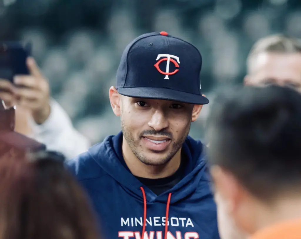 Carlos Correa still looks a little strange wearing Minnesota Twins gear. (Photo by F. Carter Smith)