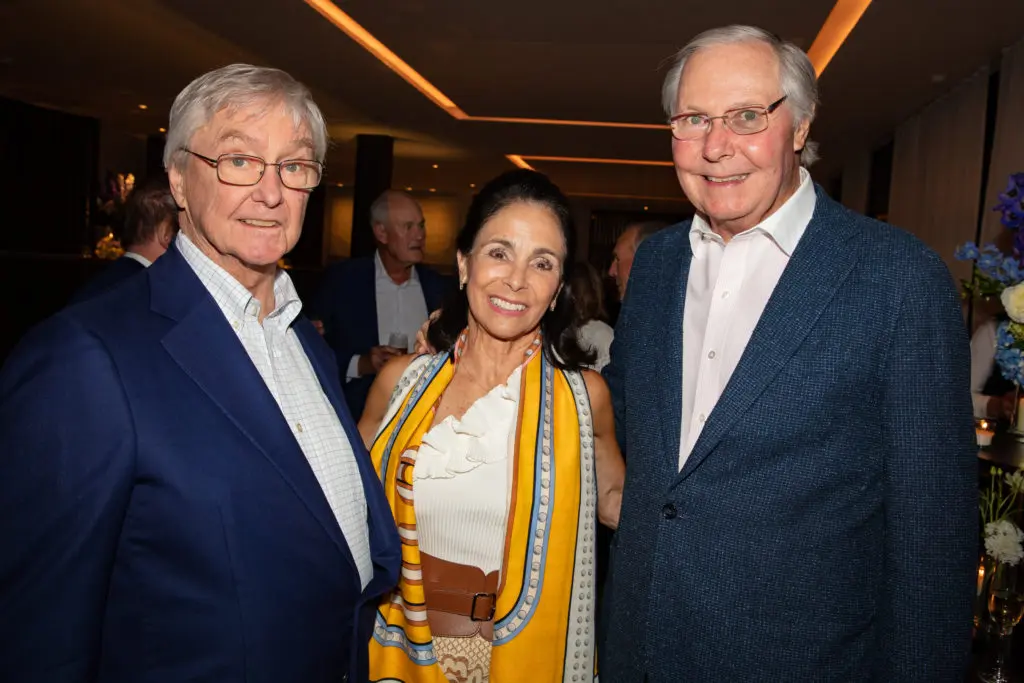 Carl Sewell, Sylvie & Gary Crum at the MD Anderson Cancer Center activities in Aspen.