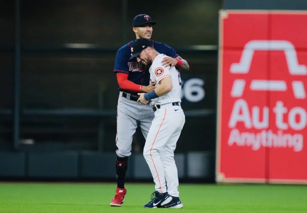 Carlos Correa gave Astros third baseman Alex Bregman a big hug. (Photo by F. Carter Smith)