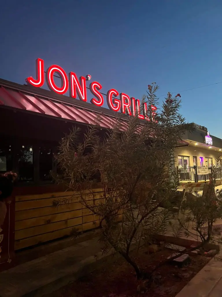 The neon signage has been installed at the new Jon's Grille along Berry Street in Fort Worth.