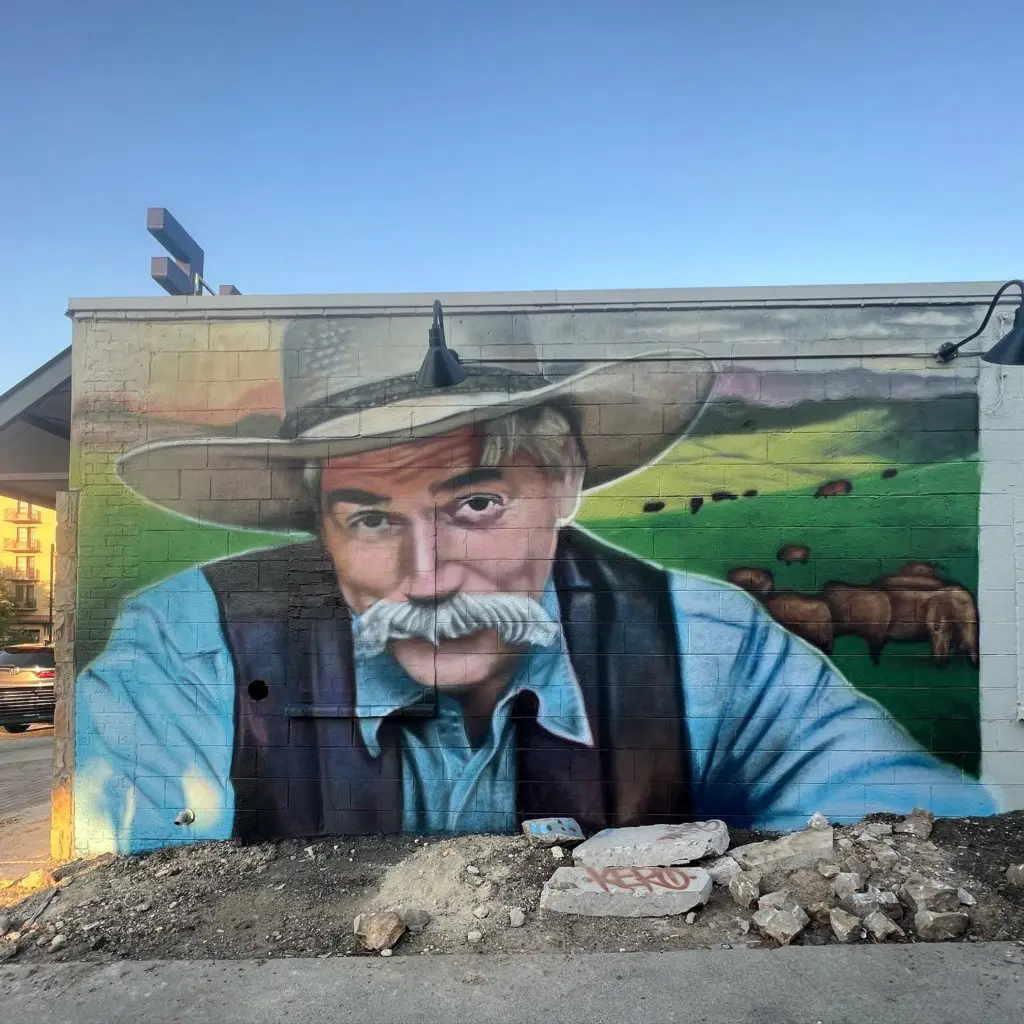 The side wall now sports a familiar face. Sam Elliot from the series 1883 painted by Juan Velazquez. Photo by Velazquez Murals.
