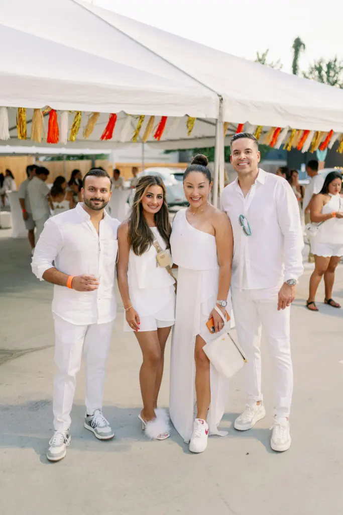Khizar & Zoya Hanif, Nancy & Jose Almodovar at the Nan & Company Properties party held during White Linen Night in The Heights. (Photo by Nan Studios)