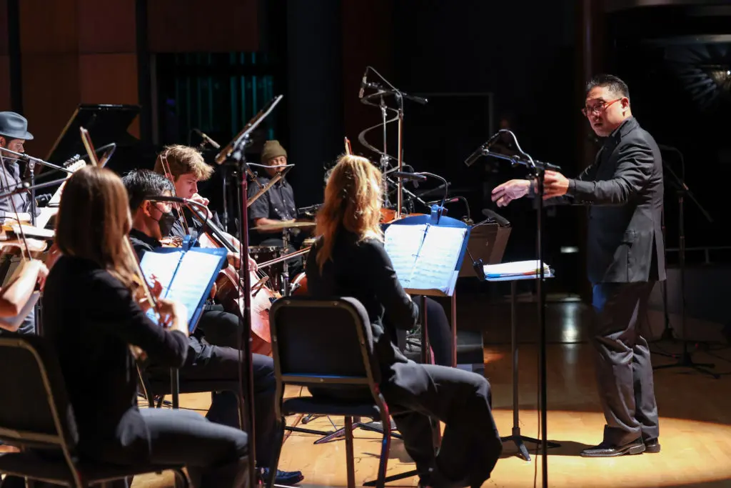 Marlon Chen conducts the "Loveletter" orchestra. (Photo by Johnny Than)