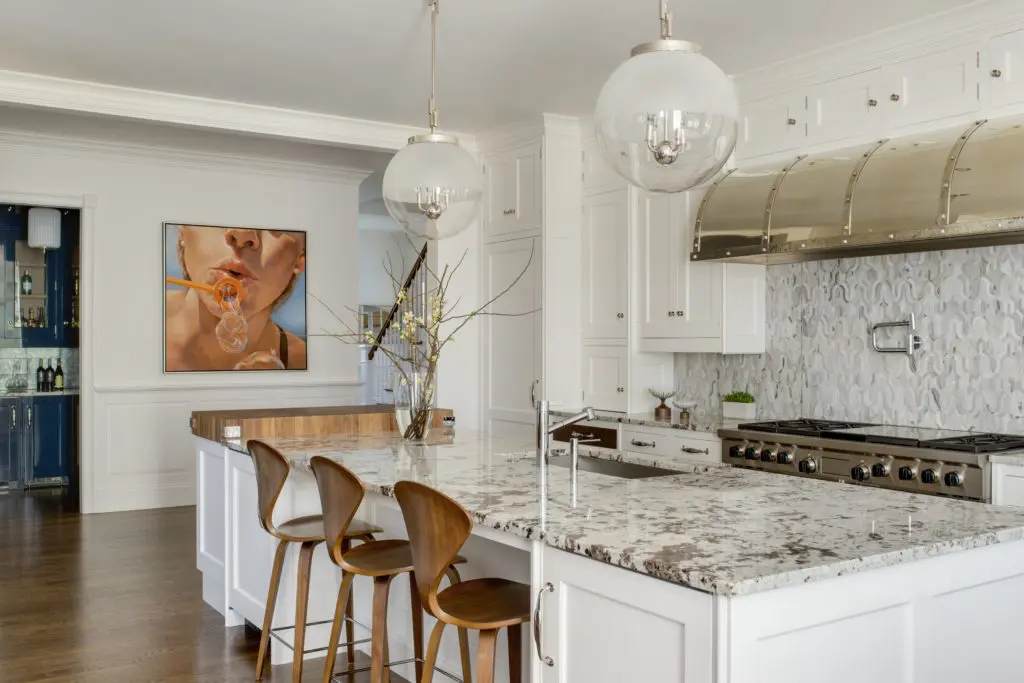 Christopher Peacock was at the forefront of the white kitchen trend, popular for its timeless nature. Photo by Jessica Delaney, Interiors by Eric Roseff Weston.