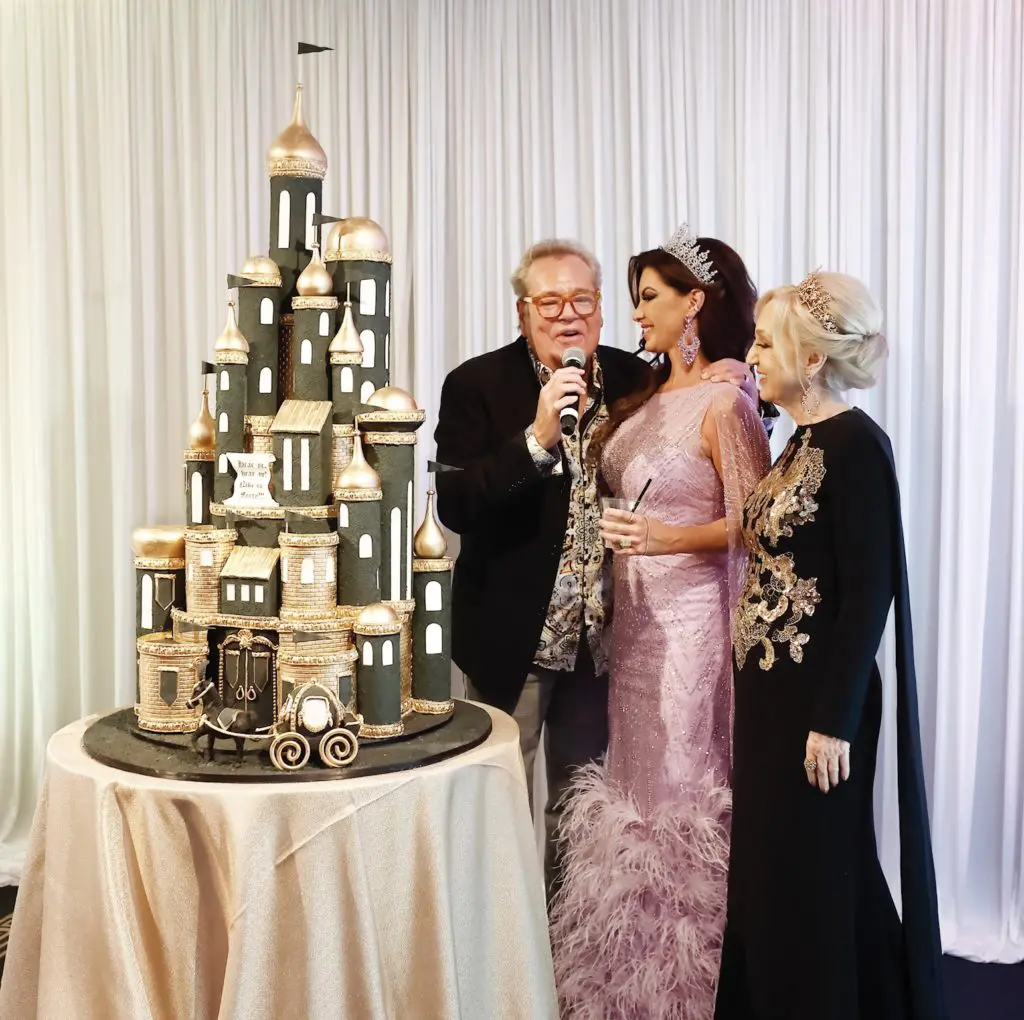Bubba McNeely sings 'Happy Birthday' to Nicole Lassiter with her mother Denise O'Brian at the fantasy party Hotel ZaZa. (Photo by Quy Tran)