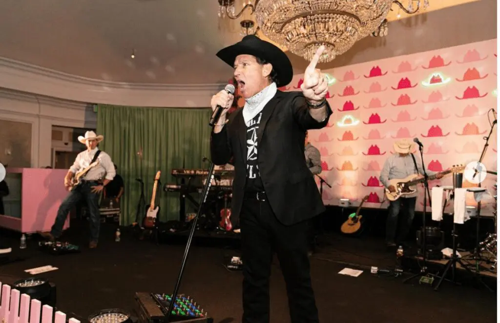Tony Buzbee sings 'Happy Birthday' to his bride, Frances Moody Buzbee, at her 30th birthday party at River Oaks Country Club. (Photo by Pixel Studio Productions)