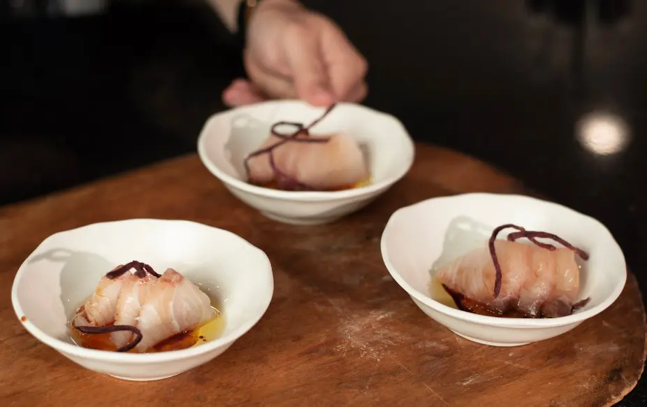 ReikiNa brings yellowtail sashimi with apricot jam, tamari, olive oil and crispy potato. (Photo by  Dylan Scardino)