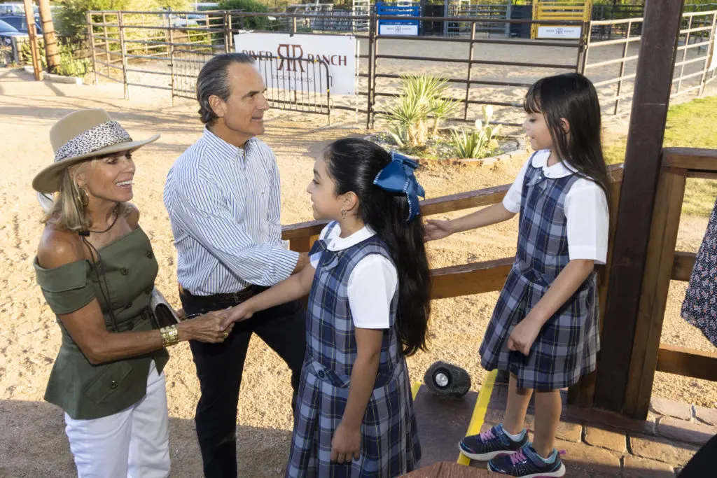 Rivertree Student Ambassadors greet Elizabeth and Bob White at Rivertree Academy Dinner Under the Stars in Fort Worth, Texas on September 27, 2022. (Photo by Sharon Ellman)