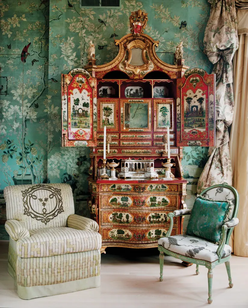 The elaborately painted Italian Lacca Povera and parcel-gilt bureau cabinet, circa 1740, was made for a Medici pope, whose crest is displayed. The top is fitted with figures depicting the four seasons. The Palais Royal ormolu and mother-of-pearl inkwell is French, circa 1820. (Photography by Lisa Romerein)