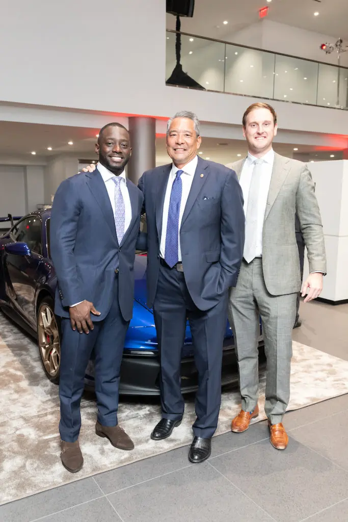 Ben Siaw, Frank Tsuru, Seth Tsuru at the ROCO Revelry gala dinner at Porsche River Oaks. (Photo by Daniel Ortiz)