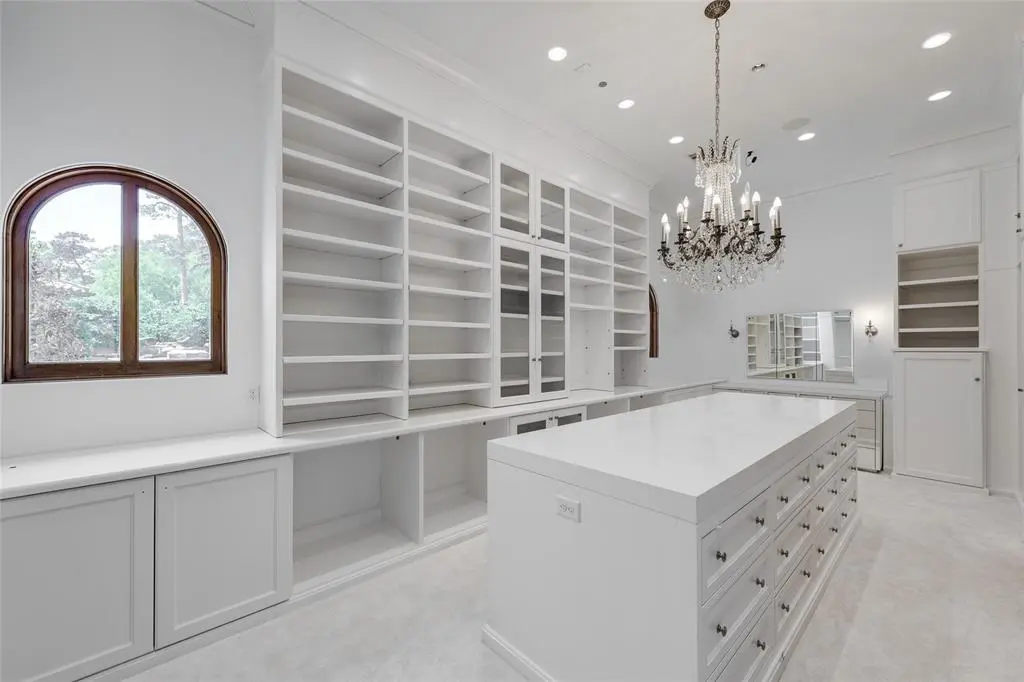 His and hers closets are what wardrobe dreams are made of.