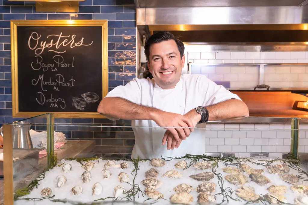 Chef and owner Aaron Bludorn at the oyster bar at this first restaurant, Bludorn. His upcoming opening of Navy Blue will focus on seafood and be located in Rice Village. Look for a November 2022 opening. (Photo by Michael Anthony)