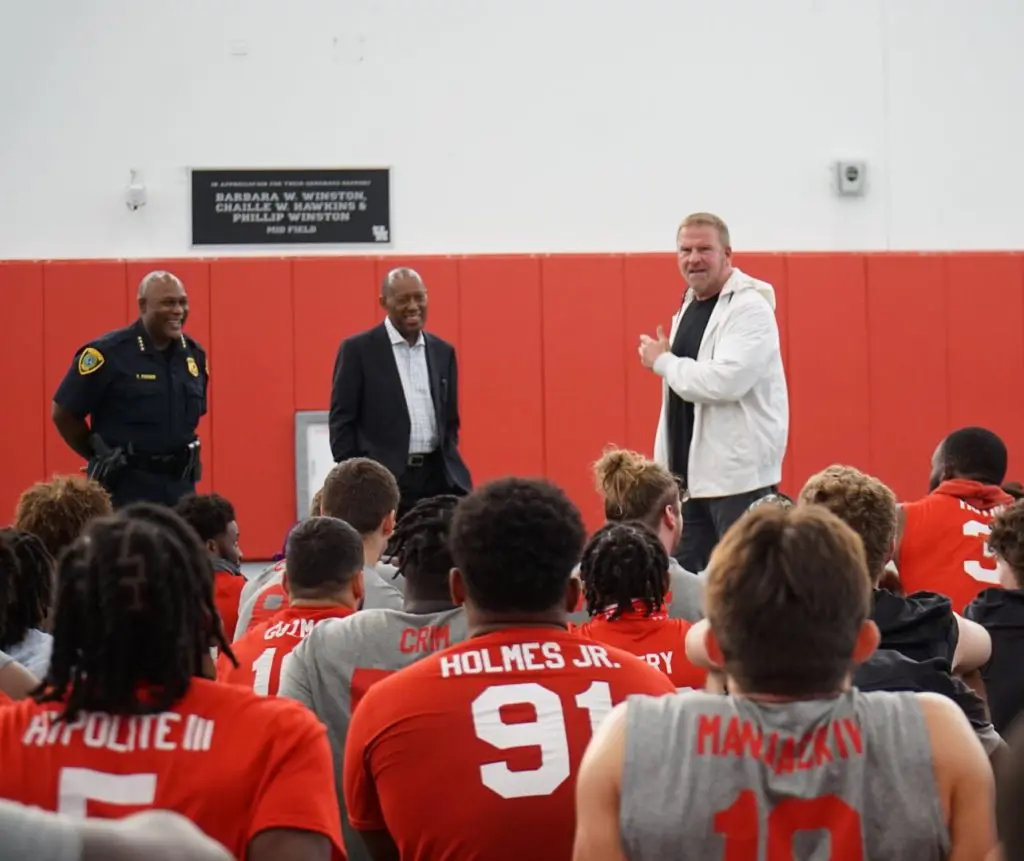 Tilman Fertitta addressed the University of Houston football team as the season opener loomed. Houston police chief Tony Finner and Houston Mayor Sylvester Turner also talked to Dana Holgorsen's squad. (@UHCougarFB)