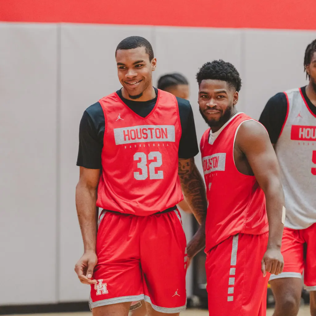Reggie Chaney and Jamal Shead shared a laugh during the University of Houston basketball team's first official fall practice of the 2022-23 season. (@UHCougarMBK)
