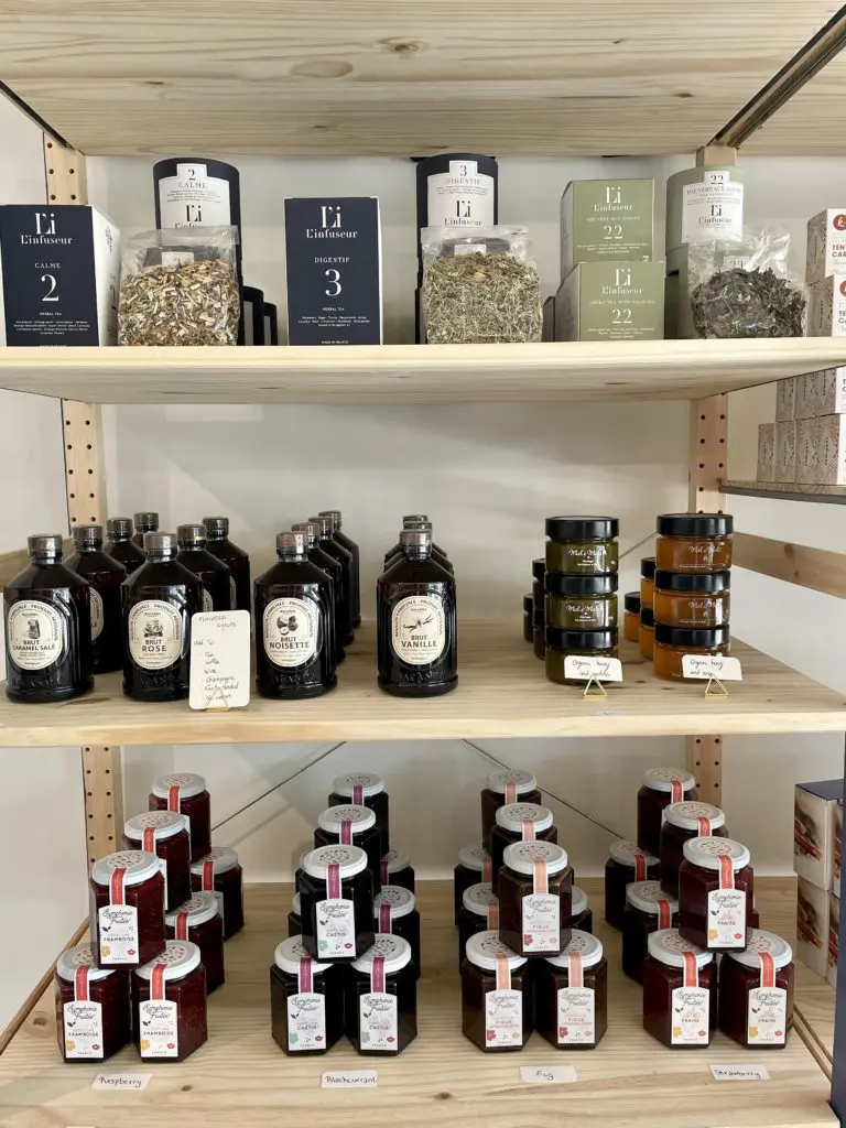 Peruse honey, jam, coffee and tea in the Marcel Market grocery section.