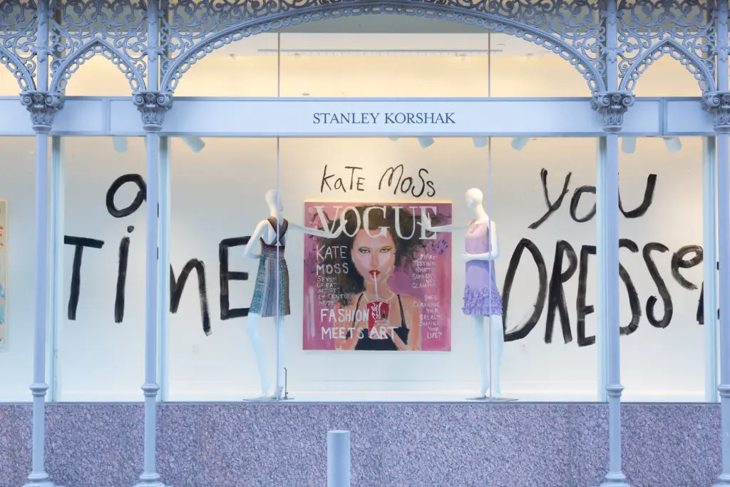 Kate Moss pops in a new window display at Stanley Korshak. (Photography by Hal Samples) 