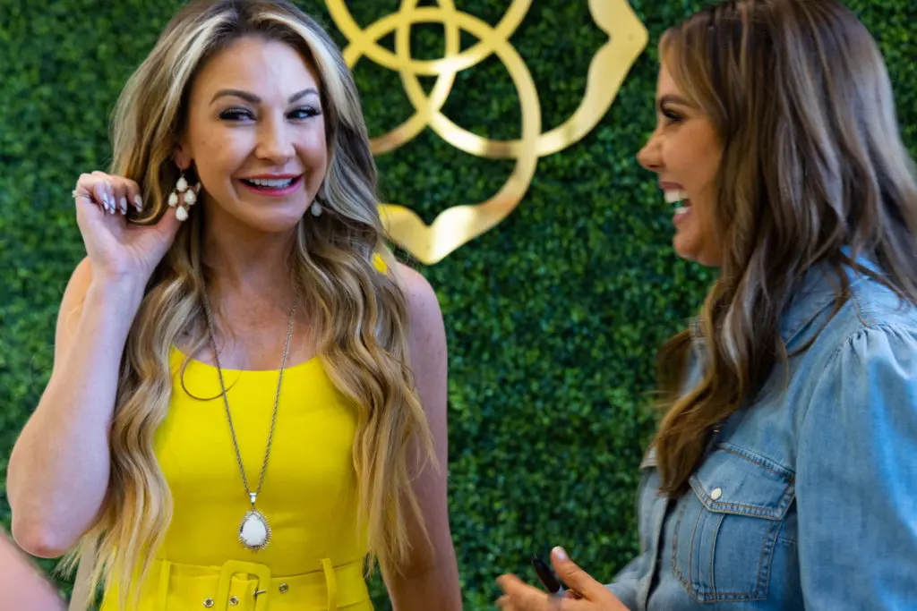 Fan Keli Rabon shares a moment with Kendra Scott at her book signing in City Centre.  (Photo by Shannon O’Hara)