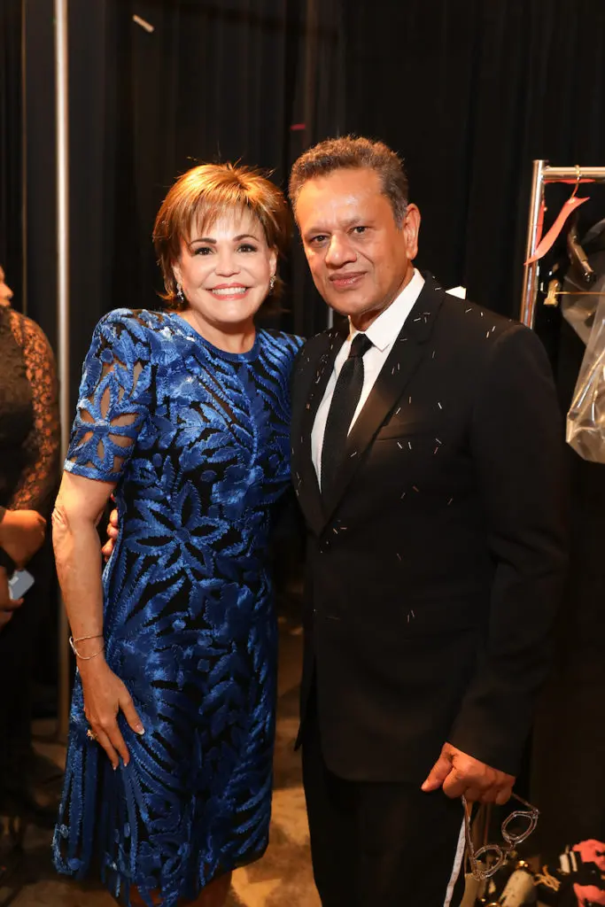 As 2022 Best Dressed luncheon chair Hallie Vanderhider visits with the Neiman Marcus featured designer Naeem Khan. (Photo by Priscilla Dickson)